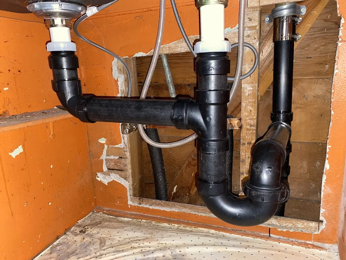 Professional Garbage Disposal Repair equipment and tools on the job in Fort Kent